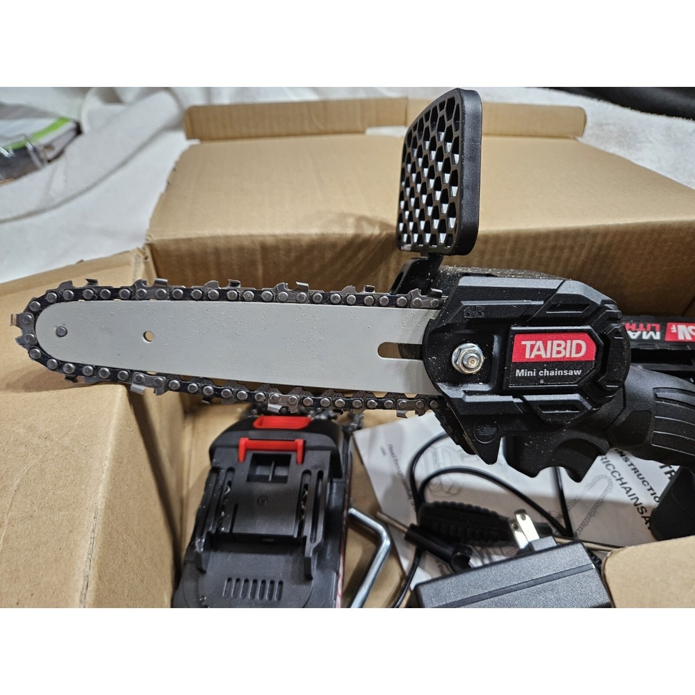 Taibid Mini Chainsaw Hand Held Cordless W Battery Charger Xtra Chain & Instructi
